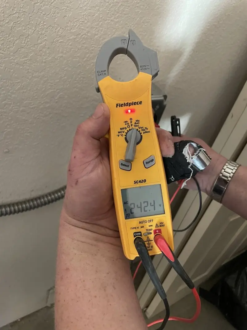 Voltage testing with clamp meter during Generator Installation in West Hattiesburg